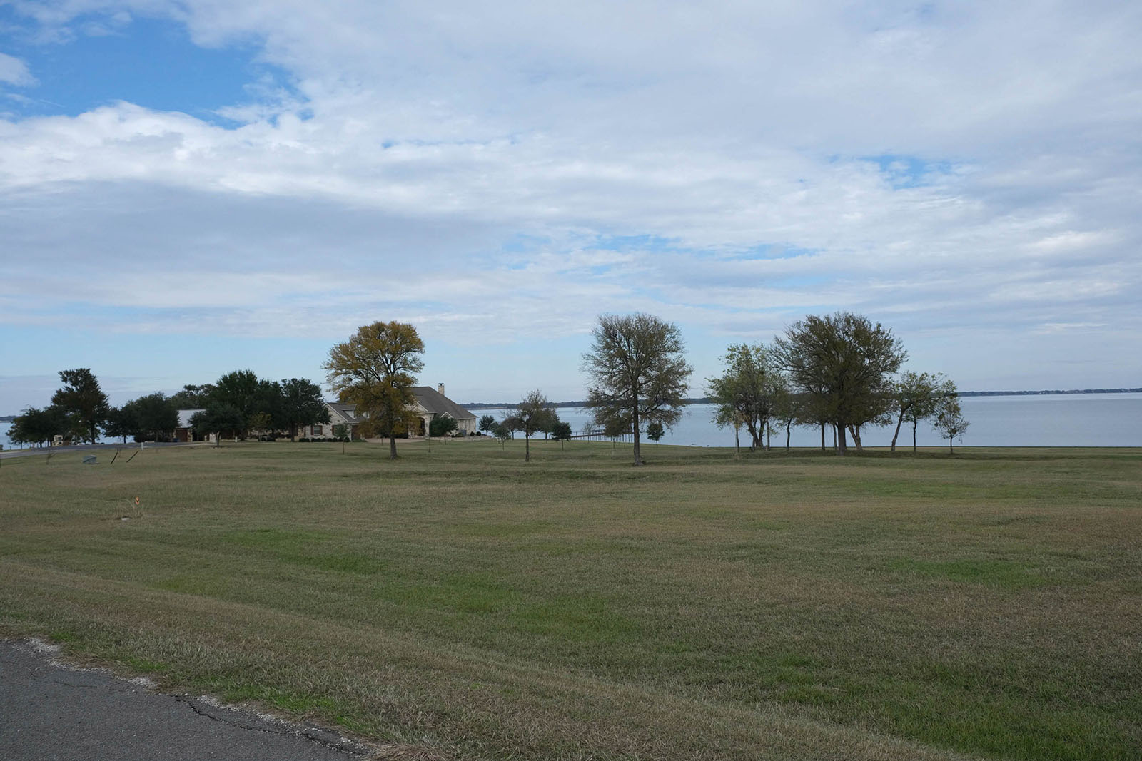 Picturesque views of community, homes, and lake