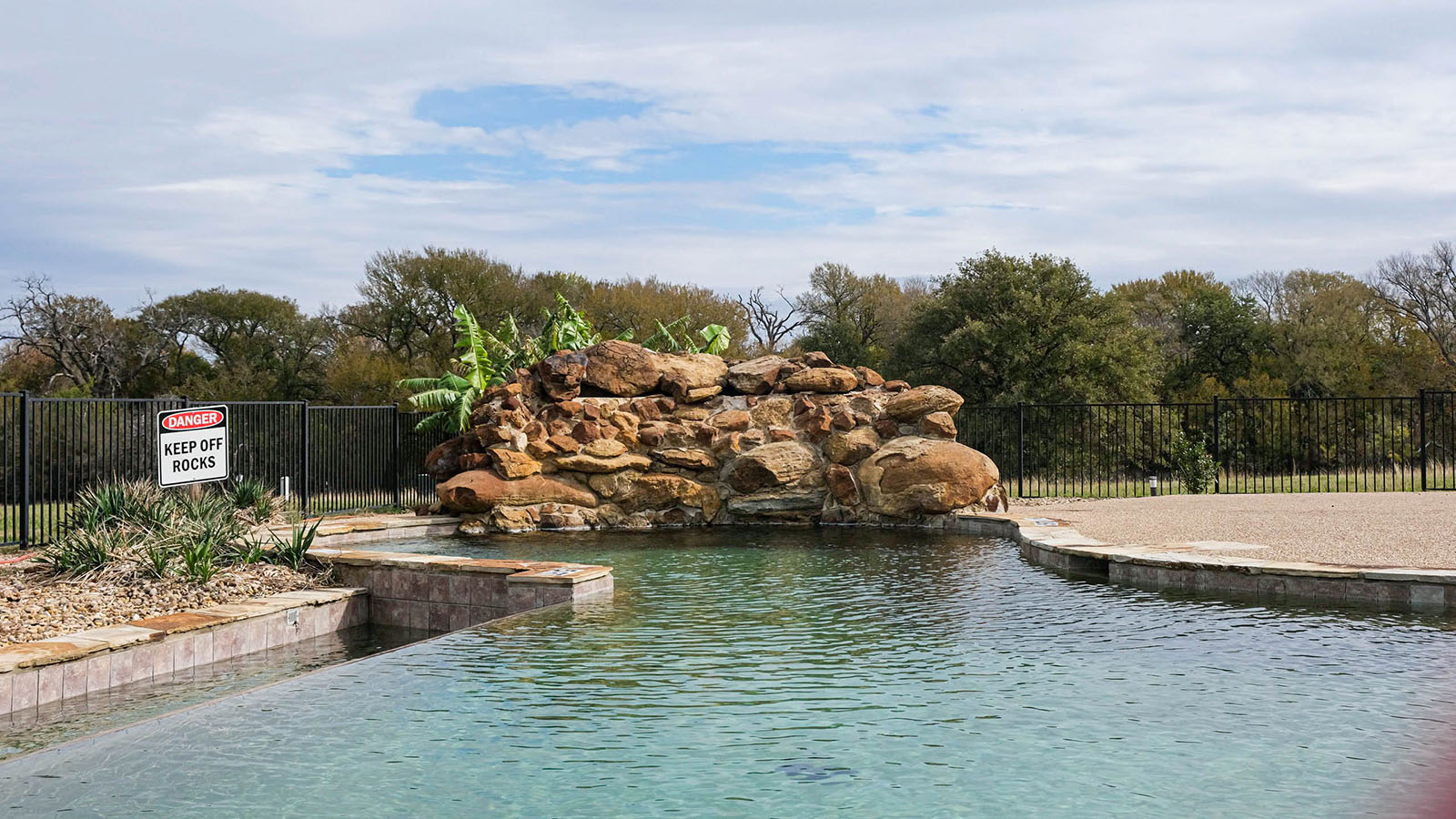 Swimming pool The community pool with some rock decorative areas.